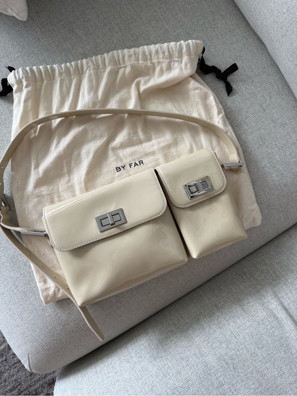 BY FAR Cream Patent Leather Crossbody Belt Bag with Dual Pouches